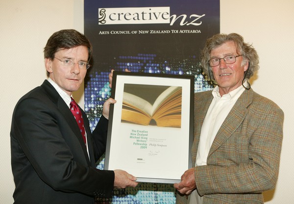 Michael King Fellowship recipient Philip Simpson (Right) receiving his award from the Hon Chris Finlayson (left) Minister of Arts Culture and Heritage.